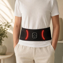 Person wearing the red light therapy wrap around the waist, over clothing